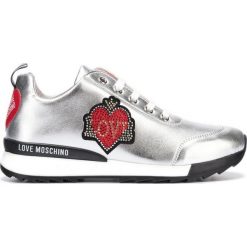 Love Moschino Tenisówki Srebrny. Szare trampki i tenisówki damskie Love Moschino, z aplikacjami, ze skóry, bez zapięcia. Za 1070,95 zł.