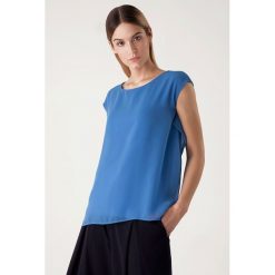 Bluzka w kolorze niebieskim. Niebieskie bluzki damskie Far Far Fashion, Ryłko by Agnes&Paul, bez wzorów, z okrągłym kołnierzem, bez rękawów. W wyprzedaży za 59,95 zł.