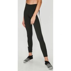 Reebok Classic - Legginsy. Czarne spodnie damskie marki Reebok Classic, s, bez wzorów, z elastanu. W wyprzedaży za 139,90 zł.