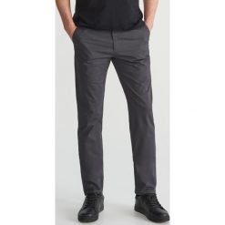 Spodnie chino - Szary. Szare chinosy męskie marki Reserved, m. Za 99,99 zł.
