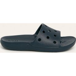 Crocs - Klapki. Różowe klapki damskie Crocs, bez wzorów, z gumy, bez obcasa, na obcasie. Za 89,90 zł.