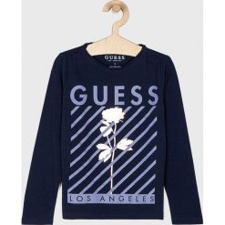 Guess Jeans - Bluzka dziecięca 118 - 175 cm. Niebieskie bluzki dziewczęce Guess Jeans, z nadrukiem, z bawełny, z okrągłym kołnierzem, bez rękawów, bez kaptura. Za 89,90 zł.
