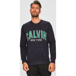 Calvin Klein Jeans - Bluza. Niebieskie bluzy męskie Calvin Klein Jeans, xl, z aplikacjami, z elastanu, z okrągłym kołnierzem, bez rękawów, bez kaptura. W wyprzedaży za 239,90 zł.