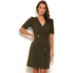 Sukienka "Manon" w kolorze khaki. Brązowe sukienki damskie Manoukian, s, midi. W wyprzedaży za 109,95 zł.