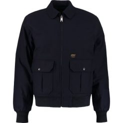 Carhartt WIP AVIATOR Kurtka zimowa dark navy. Niebieskie kurtki męskie marki Carhartt WIP, na zimę, xl, bez wzorów, z bawełny, bez kaptura. W wyprzedaży za 411,95 zł.