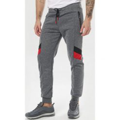 Ciemnoszare Spodnie Raenia. Szare spodnie męskie Born2be, xl, bez wzorów, z dresówki. Za 59,99 zł.