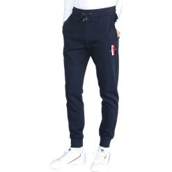 Tommy Hilfiger Spodnie dresowe Niebieski. Niebieskie spodnie męskie TOMMY HILFIGER, l, bez wzorów, z elastanu. Za 554,95 zł.