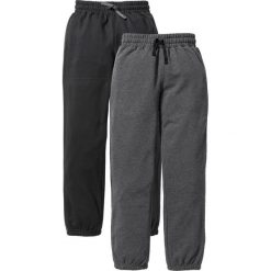 Spodnie dresowe (2 pary) bonprix czarny + antracytowy melanż. Szare dresy chłopięce marki bonprix, w paski, z dresówki. Za 75,98 zł.