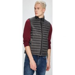 Tommy Hilfiger - Bezrękawnik puchowy. Żółte kurtki męskie TOMMY HILFIGER, xl, bez wzorów, z materiału, bez kaptura. W wyprzedaży za 499,90 zł.
