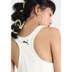 Fenty PUMA by Rihanna Top vanilla ice. Białe koszulki damskie marki Fenty PUMA by Rihanna, xs, bez wzorów, z bawełny, bez kołnierzyka, bez rękawów. Za 459,00 zł.