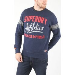 SuperDry Bluza Niebieski. Niebieskie bluzy męskie Superdry, l, z nadrukiem, z bawełny, bez kołnierzyka, bez rękawów, bez kaptura. Za 335,95 zł.