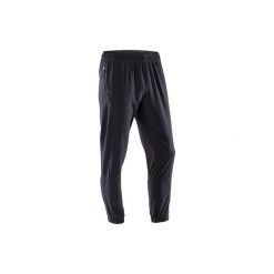 Spodnie dresowe fitness cardio FPA 500 męskie. Czarne spodnie męskie DOMYOS, xl, bez wzorów, z elastanu, sportowe. Za 79,99 zł.