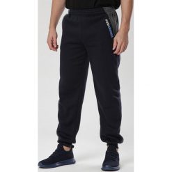 Granatowe Spodnie Phisesha. Niebieskie spodnie męskie Born2be, xl, bez wzorów, z dresówki. Za 49,99 zł.