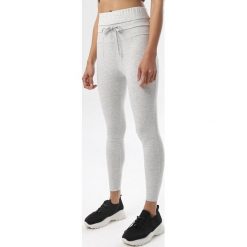 Jasnoszare Legginsy Aurashi. Szare legginsy damskie Born2be, s, bez wzorów. W wyprzedaży za 49,99 zł.