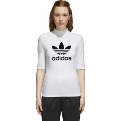 KOSZULKA CLRDO (42). Koszulki damskie Adidas, bez wzorów, z bawełny, eleganckie, z golfem. W wyprzedaży za 109,99 zł.