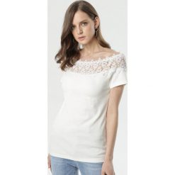 Biała Bluzka Elinoire. Białe bluzki damskie Born2be, s, bez wzorów, z jeansu, bez kołnierzyka, z krótkim rękawem. Za 59,99 zł.