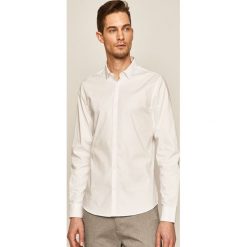 Medicine - Koszula Basic. Niebieskie koszule męskie MEDICINE, s, bez wzorów, z elastanu, eleganckie, z klasycznym kołnierzykiem, z długim rękawem. Za 129,90 zł.