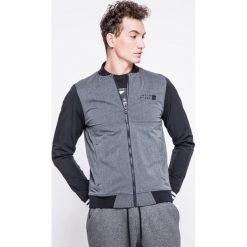 Under Armour - Bluza Sportstle Woven Bomber. Szare bluzy męskie marki Under Armour, s, z elastanu, bez kaptura. W wyprzedaży za 239,90 zł.