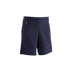 Spodenki fitness kardio FST 500 męskie. Niebieskie spodenki sportowe męskie DOMYOS, m, bez wzorów, z elastanu, sportowe, na fitness i siłownię. Za 59,99 zł.