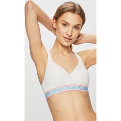 Emporio Armani - Biustonosz sportowy. Białe biustonosze sportowe damskie Emporio Armani, m, z haftami, z elastanu. W wyprzedaży za 199,90 zł.