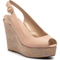 Espadryle GUESS - Hardy2 FL6HRD LEA04 NATU. Brązowe espadryle damskie Guess, z aplikacjami, ze skóry ekologicznej, bez obcasa, na obcasie. W wyprzedaży za 539,00 zł.