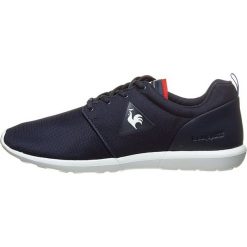 Sneakersy "Dynacomf" w kolorze granatowym. Niebieskie sneakersy męskie le coq sportif, bez wzorów, na sznurówki. W wyprzedaży za 215,95 zł.