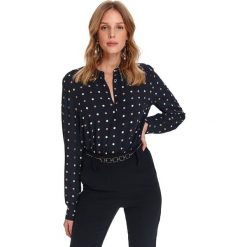 Elegancka koszula damska z wiązaniem. Czarne bluzki damskie Top Secret, bez wzorów, eleganckie, z klasycznym kołnierzykiem, bez rękawów. Za 129,99 zł.