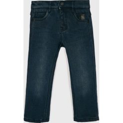 Name it - Jeansy dziecięce 92-122 cm. Niebieskie spodnie chłopięce marki Name it, bez wzorów, z elastanu. W wyprzedaży za 69,90 zł.