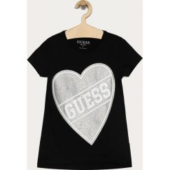 Guess Jeans - T-shirt dziecięcy 116-175 cm. Białe bluzki dziewczęce Guess Jeans, z nadrukiem, z elastanu, z okrągłym kołnierzem, z krótkim rękawem, krótkie, bez kaptura. Za 89,90 zł.