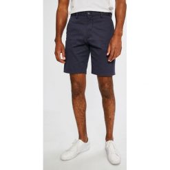 Lacoste - Szorty. Niebieskie spodenki i szorty męskie marki Lacoste, l, z elastanu, casualowe. W wyprzedaży za 299,90 zł.