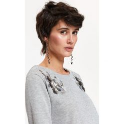 DŁUGIE KOLCZYKI. Czarne kolczyki damskie Top Secret. W wyprzedaży za 14,99 zł.
