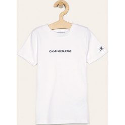 Calvin Klein Jeans - T-shirt dziecięcy 128-176 cm. Białe bluzki dziewczęce Calvin Klein Jeans, z nadrukiem, z elastanu, z okrągłym kołnierzem, z krótkim rękawem, krótkie, bez kaptura. Za 159,90 zł.