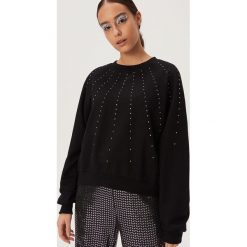 Bluza z błyszczącą aplikacją - Czarny. Czarne bluzy damskie Sinsay, s, z aplikacjami, bez rękawów, bez kaptura. Za 59,99 zł.
