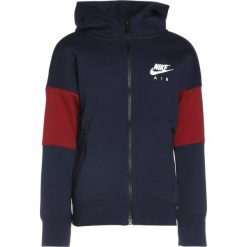 Nike Performance AIR Bluza rozpinana obsidian/team red/white. Niebieskie bluzy chłopięce marki Nike Performance, z bawełny. W wyprzedaży za 191,20 zł.
