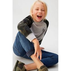 Mango Kids - Jeansy dziecięce Dudes 110-164 cm. Zielone spodnie chłopięce Mango Kids, bez wzorów, z elastanu. Za 99,90 zł.