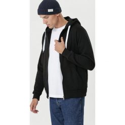 Czarna Bluza Aspley. Czarne bluzy męskie Born2be, s, bez wzorów, bez kołnierzyka, bez rękawów, bez kaptura. W wyprzedaży za 69,99 zł.