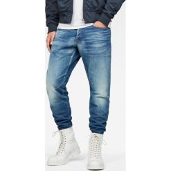 GStar DSTAQ 5POCKET TAPERED Jeansy Zwężane medium aged. Niebieskie jeansy męskie regular G-Star, z bawełny. W wyprzedaży za 439,20 zł.