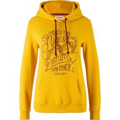 Bluza z kapturem i nadrukiem bonprix żółty curry. Żółte bluzy damskie bonprix, z nadrukiem, bez rękawów, z kapturem. Za 74,99 zł.