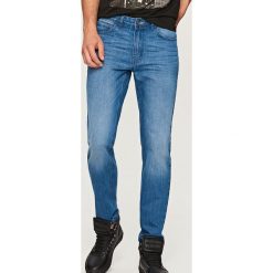 Jeansy regular fit - Niebieski. Niebieskie jeansy męskie regular Reserved. Za 99,99 zł.