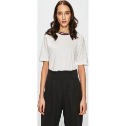 Tommy Hilfiger - Top. Białe bluzki damskie TOMMY HILFIGER, s, bez wzorów, z bawełny, z okrągłym kołnierzem. W wyprzedaży za 139,90 zł.