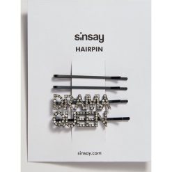 Ozdobne spinki do włosów - Czarny. Czarne spinki do włosów damskie Sinsay. Za 9,99 zł.