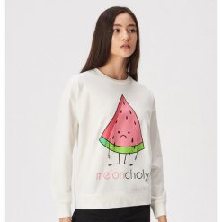 Bluza Meloncholy - Kremowy. Białe bluzy damskie Sinsay, s, bez wzorów, bez rękawów, bez kaptura. Za 39,99 zł.