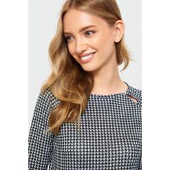 Dopasowany sweter w pepitkę. Swetry damskie Greenpoint, bez wzorów, z elastanu, bez rękawów, bez kaptura. Za 79,99 zł.