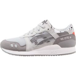 Asics Tiger GELLYTE III GS Tenisówki i Trampki mid grey/aluminum. Szare trampki męskie marki Asics Tiger, z tworzywa sztucznego. W wyprzedaży za 263,20 zł.