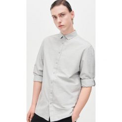 Gładka koszula - Jasny szary. Szare koszule męskie Reserved, s, bez wzorów, bez kołnierzyka, bez rękawów. W wyprzedaży za 39,99 zł.