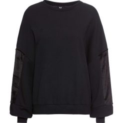 Bluza ze sztucznym futerkiem bonprix czarny. Czarne bluzy damskie bonprix, bez wzorów, bez rękawów, bez kaptura. Za 54,99 zł.