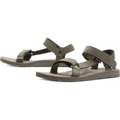 TEVA ORGINAL UNIVERSAL LEATHER > 1102799-BTOL. Buty sportowe męskie Teva, ze skóry, z paskami. W wyprzedaży za 219,99 zł.