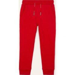Calvin Klein Jeans - Spodnie dziecięce 116-176 cm. Czerwone spodnie dziewczęce Calvin Klein Jeans, bez wzorów, z bawełny. W wyprzedaży za 139,90 zł.