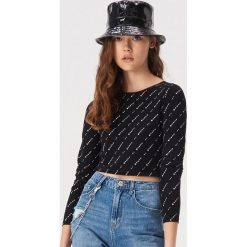 Bawełniany crop top we wzory - Czarny. Czarne topy damskie Sinsay, xl, bez wzorów, z bawełny, bez kołnierzyka. W wyprzedaży za 14,99 zł.