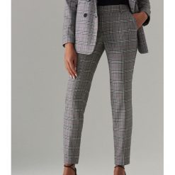 Spodnie w kratkę - Wielobarwn. Szare spodnie damskie marki Mohito. Za 139,99 zł.